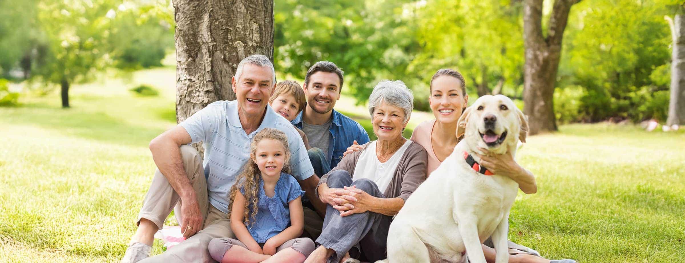 Family enjoying moment with their service dog