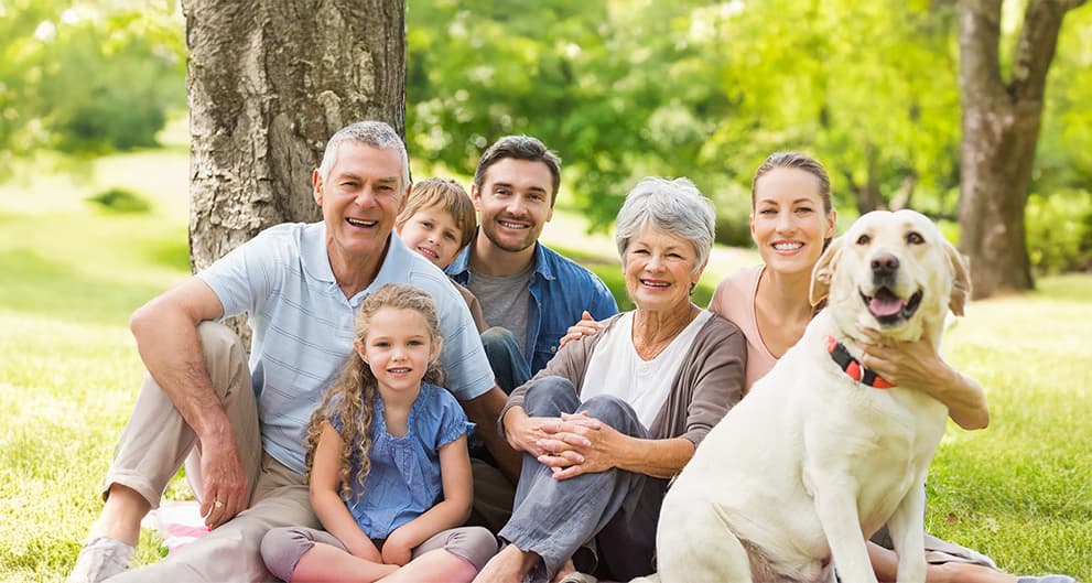 Family enjoying moment with their service dog